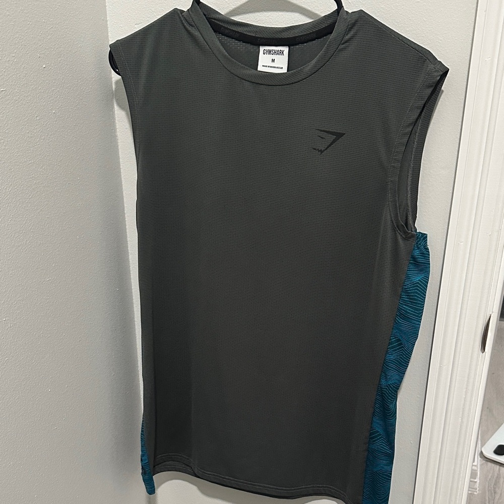 Gymshark Dark Gray Sleeveless Top with Teal Accents